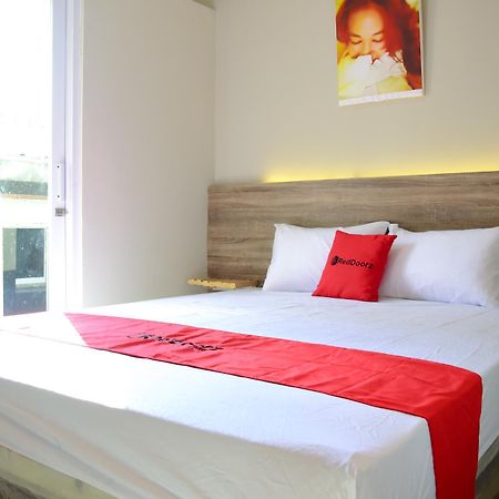 เรดดอร์ซ เนียร์ มังการ์ ดูวาสแควร์ Hotel จาการ์ตา ภายนอก รูปภาพ
